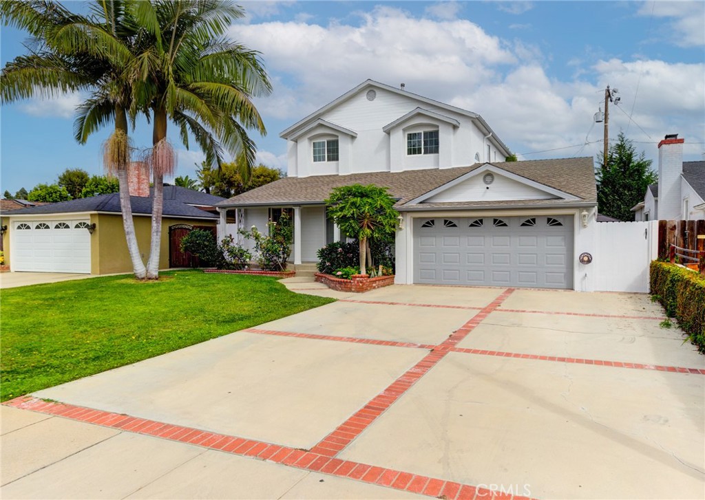 3816 Chatwin Avenue Long Beach, CA 90808 - Photo 2 of 60 a front view of house with yard and green space