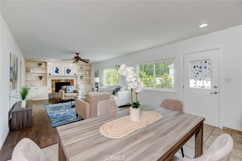 3816 Chatwin Avenue Long Beach, CA 90808 - Photo 25 of 60 a living room with furniture and a fireplace
