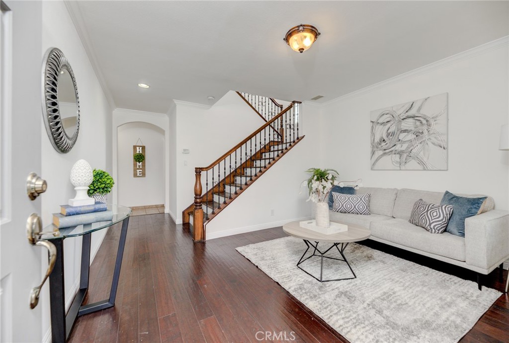 3816 Chatwin Avenue Long Beach, CA 90808 - Photo 3 of 60 a living room with furniture and wooden floor