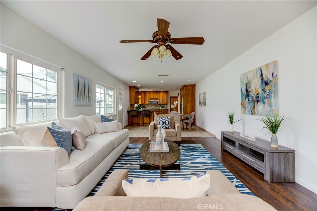 3816 Chatwin Avenue Long Beach, CA 90808 - Photo 31 of 60 a living room with furniture and a large window