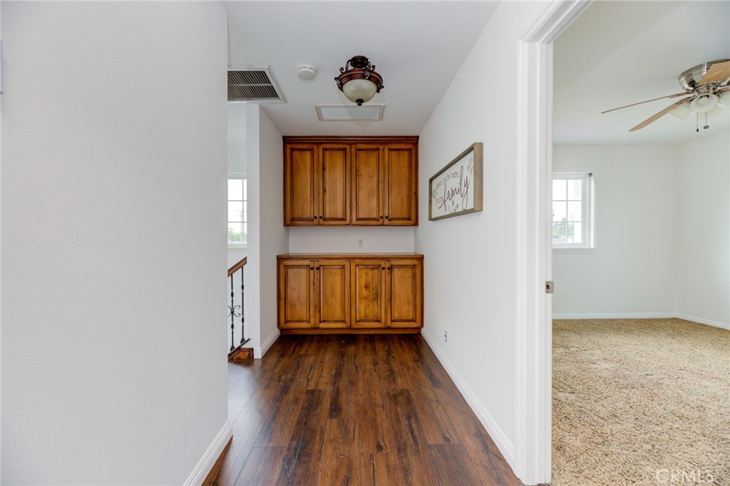 3816 Chatwin Avenue Long Beach, CA 90808 - Photo 36 of 60 a view of a hallway with wooden floor and entryway