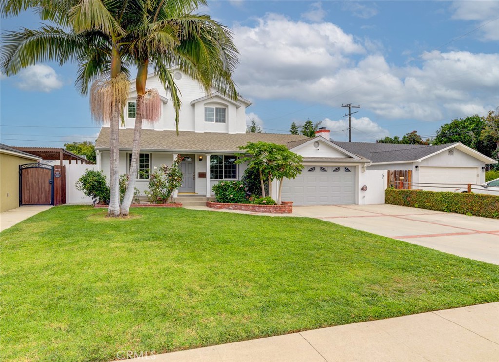 3816 Chatwin Avenue Long Beach, CA 90808 - Photo 49 of 60 a front view of house with yard and green space