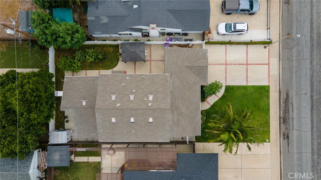 3816 Chatwin Avenue Long Beach, CA 90808 - Photo 53 of 60 an aerial view of a house with a yard and large tree
