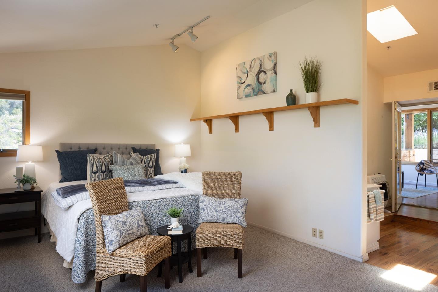 27461 Schulte Road Carmel, CA 93923 - Photo 17 of 33 a bedroom with a bed and wooden floor