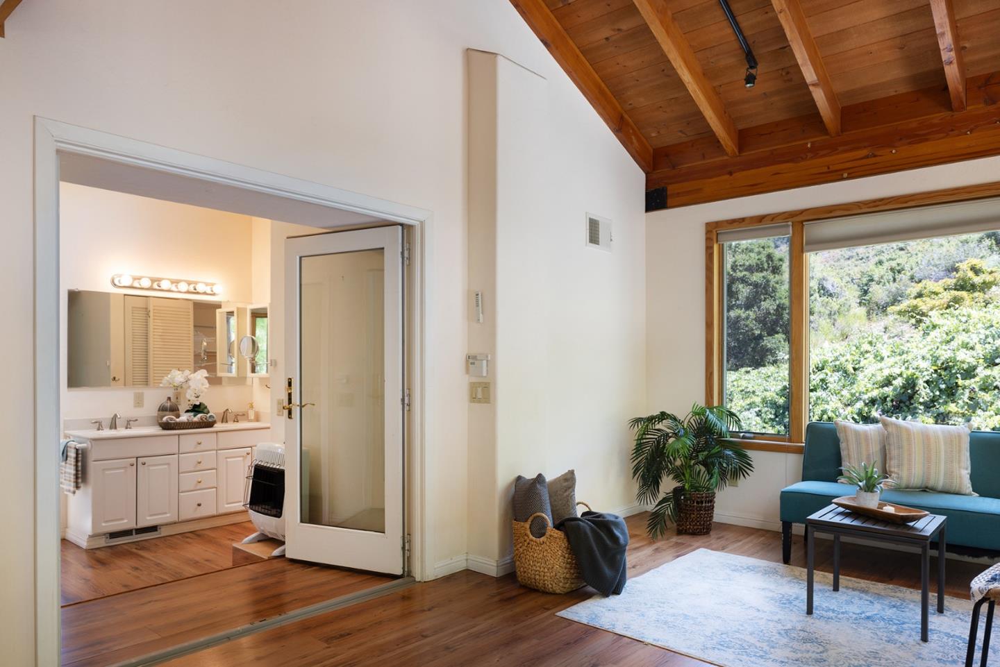 27461 Schulte Road Carmel, CA 93923 - Photo 18 of 33 a living room with furniture and a potted plant