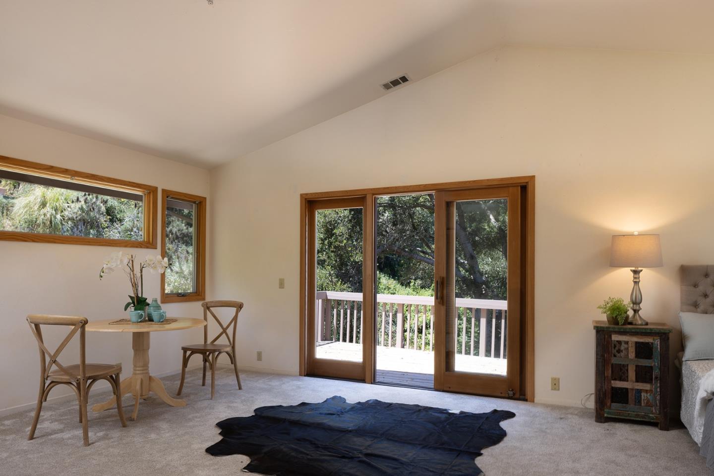 27461 Schulte Road Carmel, CA 93923 - Photo 28 of 33 a living room with furniture and a window