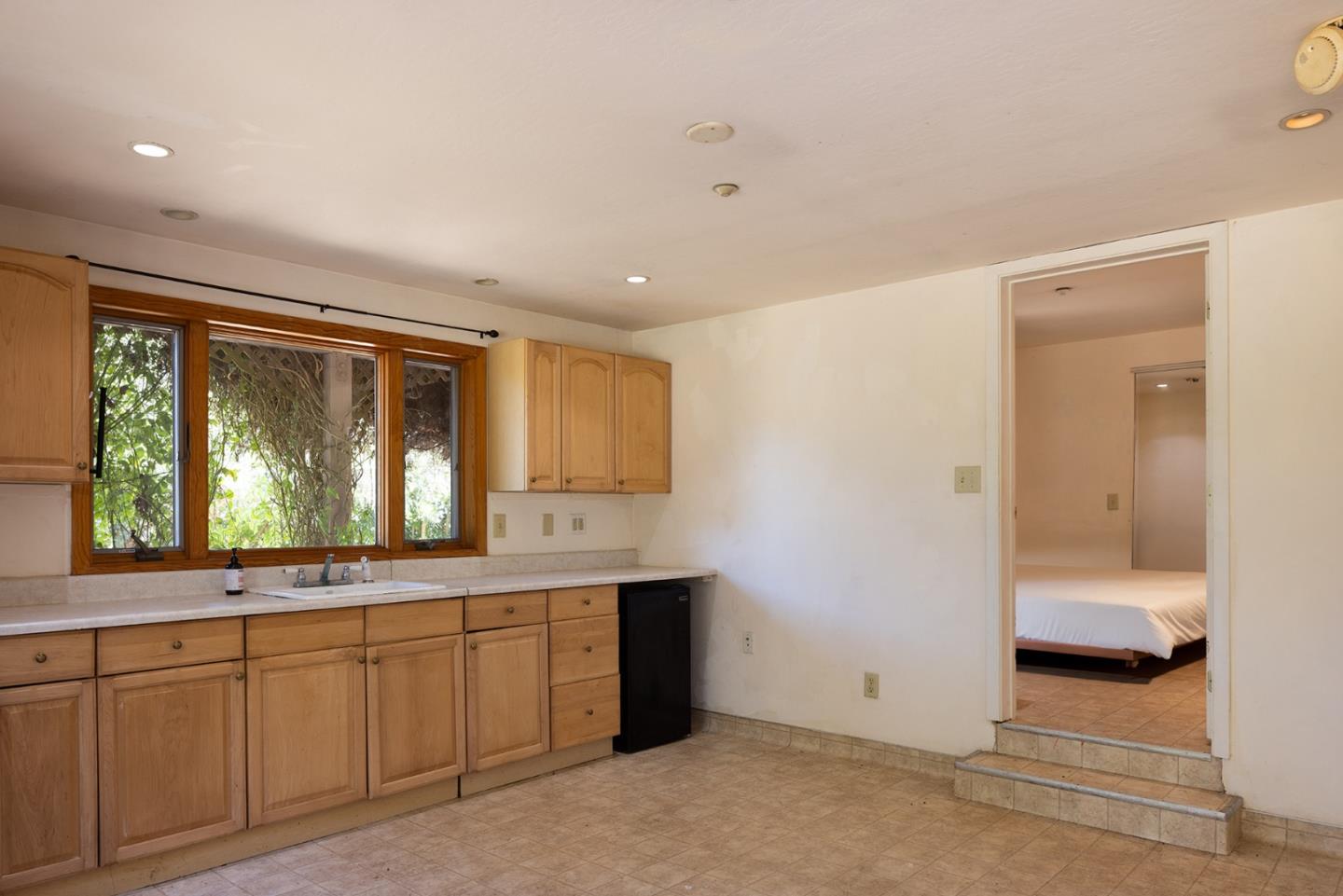 27461 Schulte Road Carmel, CA 93923 - Photo 29 of 33 a bathroom with a sink mirror and a bathtub