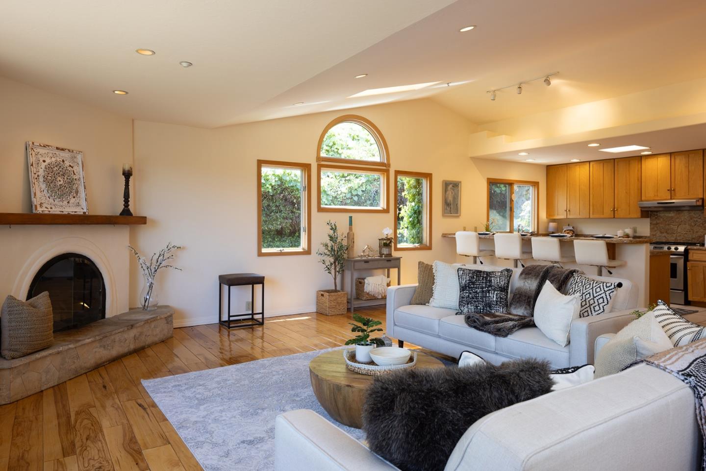 27461 Schulte Road Carmel, CA 93923 - Photo 9 of 33 a living room with furniture and a fireplace