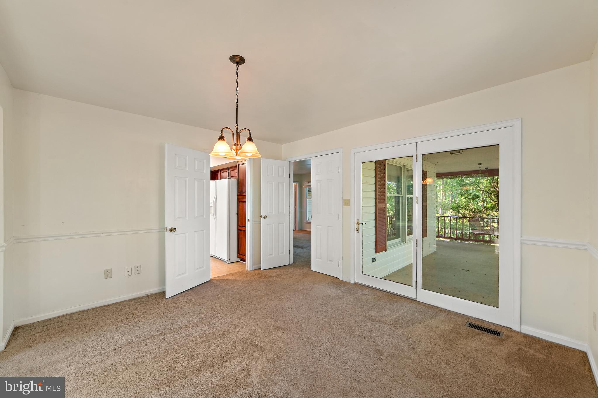 2199 Beaver Dam Road Midland, VA 22728 - Photo 27 of 74 Dining Room with Sliding Doors to Front Porch