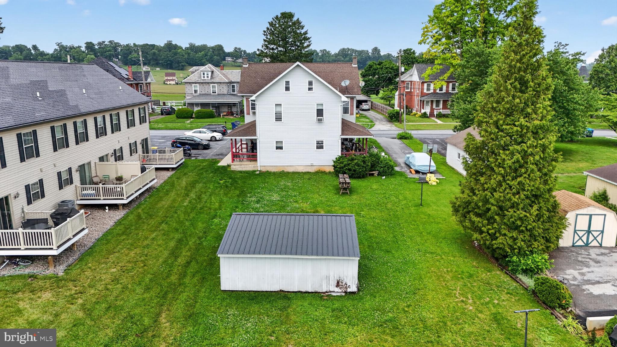 14 North Kinzer Road Kinzers, PA 17535 - Photo 26 of 34 Spacious yard with charming homes nearby.
