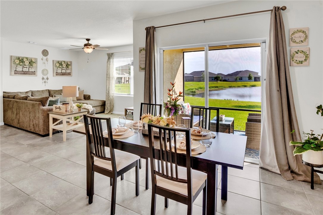 3453 Trinity Circle Fort Pierce, FL 34945 - Photo 8 of 36 a view of a dining room with furniture window and outside view