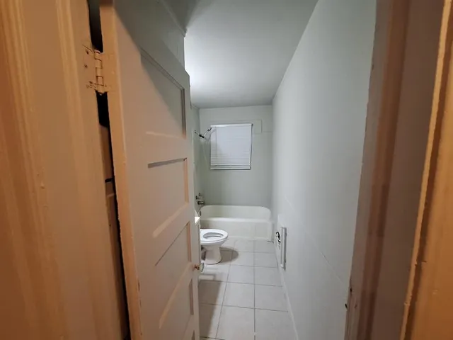 a bathroom with a sink and toilet