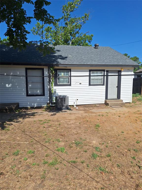 2312 Fincher Road Haltom City, TX 76117 - Photo 2 of 13 a front view of a house with a yard