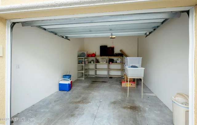 an aerial view of residential house and outdoor space