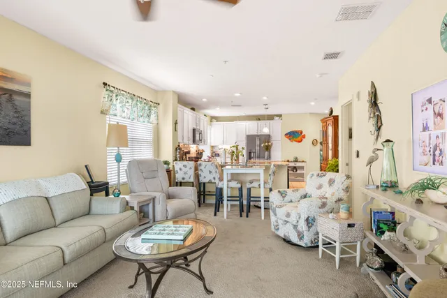 a kitchen with kitchen island granite countertop counter top space appliances and a center island