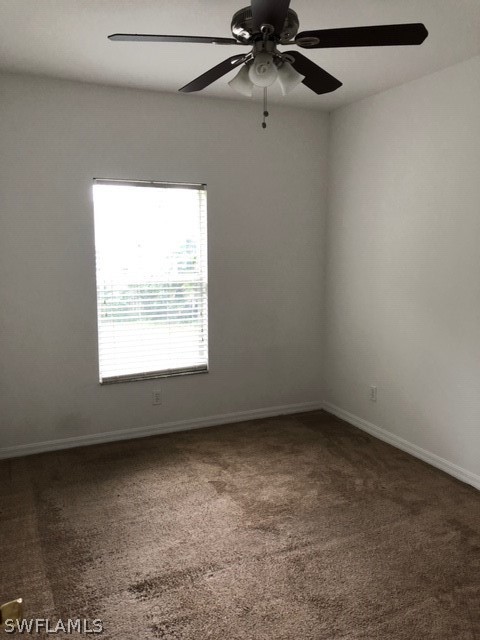 18327 Heather Road Fort Myers, FL 33967 - Photo 12 of 15 an empty room with a window