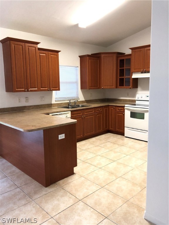 18327 Heather Road Fort Myers, FL 33967 - Photo 3 of 15 a kitchen with stainless steel appliances granite countertop a stove a sink dishwasher and a refrigerator