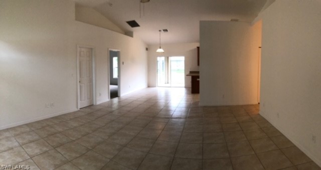 18327 Heather Road Fort Myers, FL 33967 - Photo 5 of 15 a view of a hallway with wooden floor