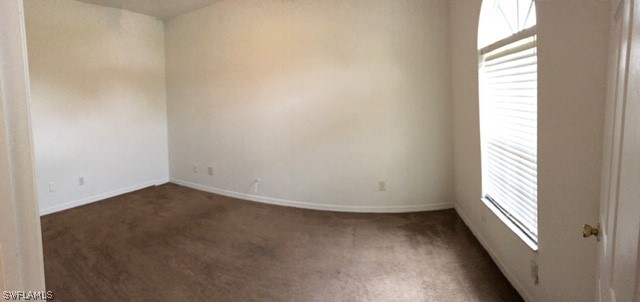 18327 Heather Road Fort Myers, FL 33967 - Photo 6 of 15 an empty room with windows