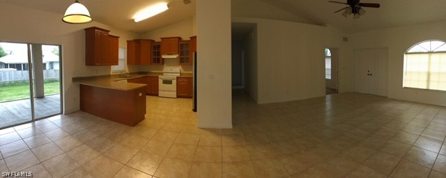 18327 Heather Road Fort Myers, FL 33967 - Photo 7 of 15 a kitchen with stainless steel appliances granite countertop a sink and a stove