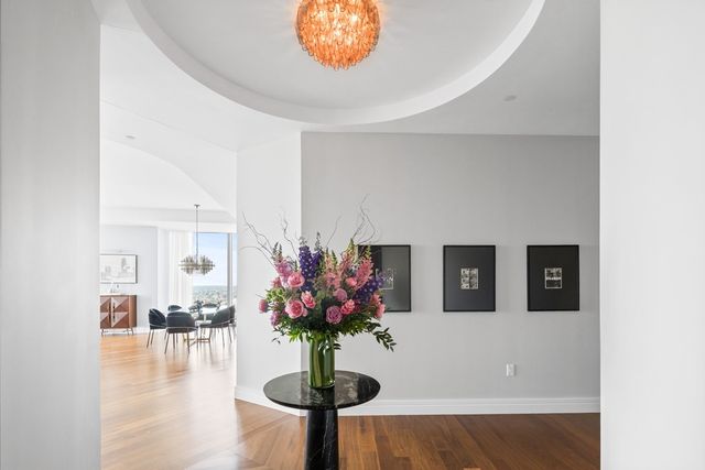 a vase of flowers sitting on a table