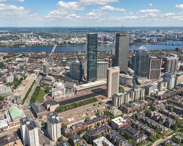 a view of a city with tall buildings