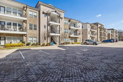 a view of a building with a street