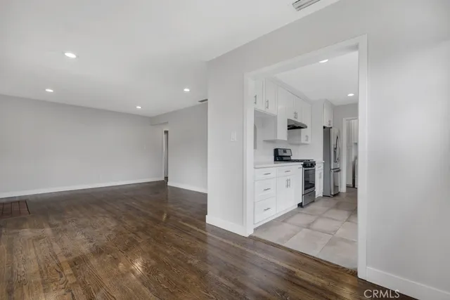 a view of a kitchen with electric appliances