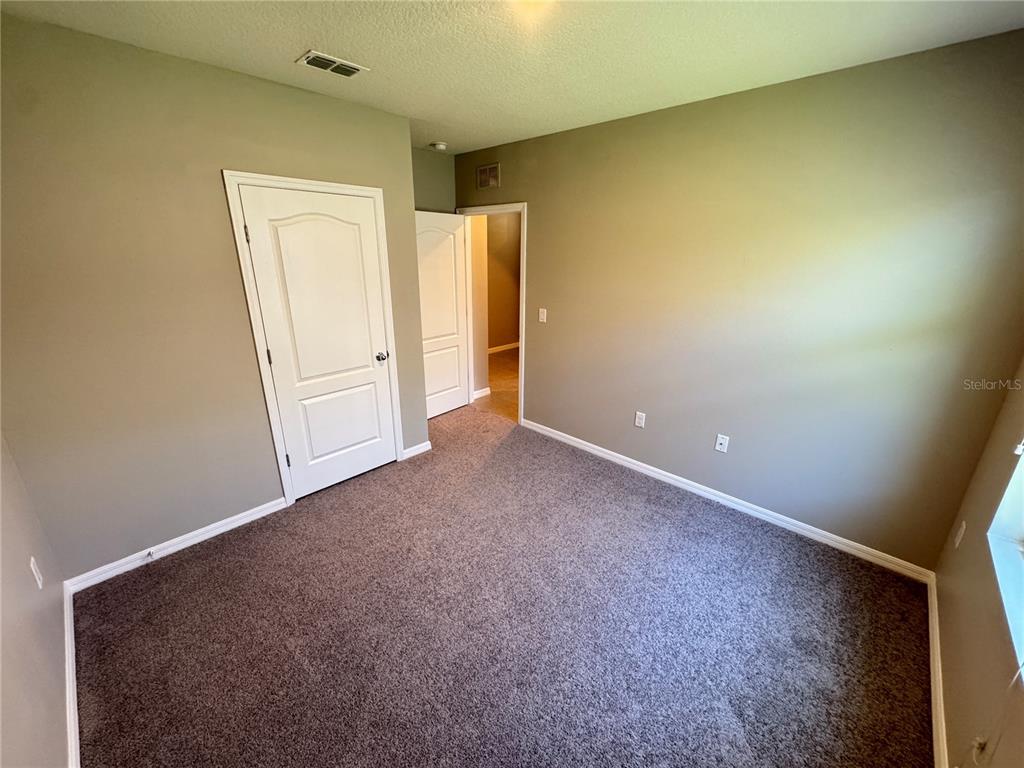 2323 Silverview Drive Lakeland, FL 33811 - Photo 11 of 33 an empty room with closet area