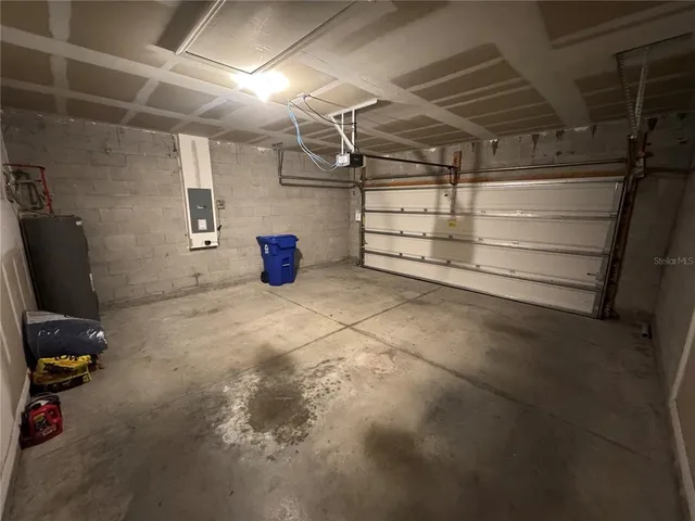 a kitchen with a sink stove and refrigerator