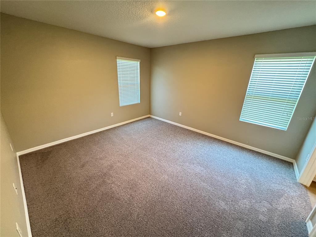 2323 Silverview Drive Lakeland, FL 33811 - Photo 26 of 33 an empty room with windows