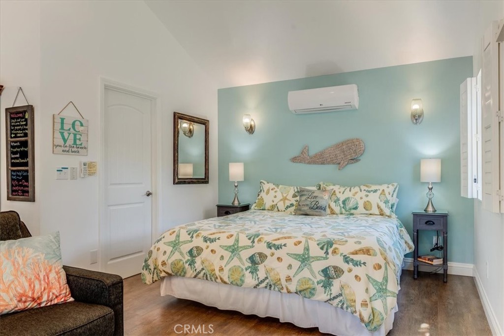 1560 Emerson Road Cambria, CA 93428 - Photo 11 of 13 Walk in closet to the left of the bed. Lots of light, and plantation shutters to open wide to the lovely views.