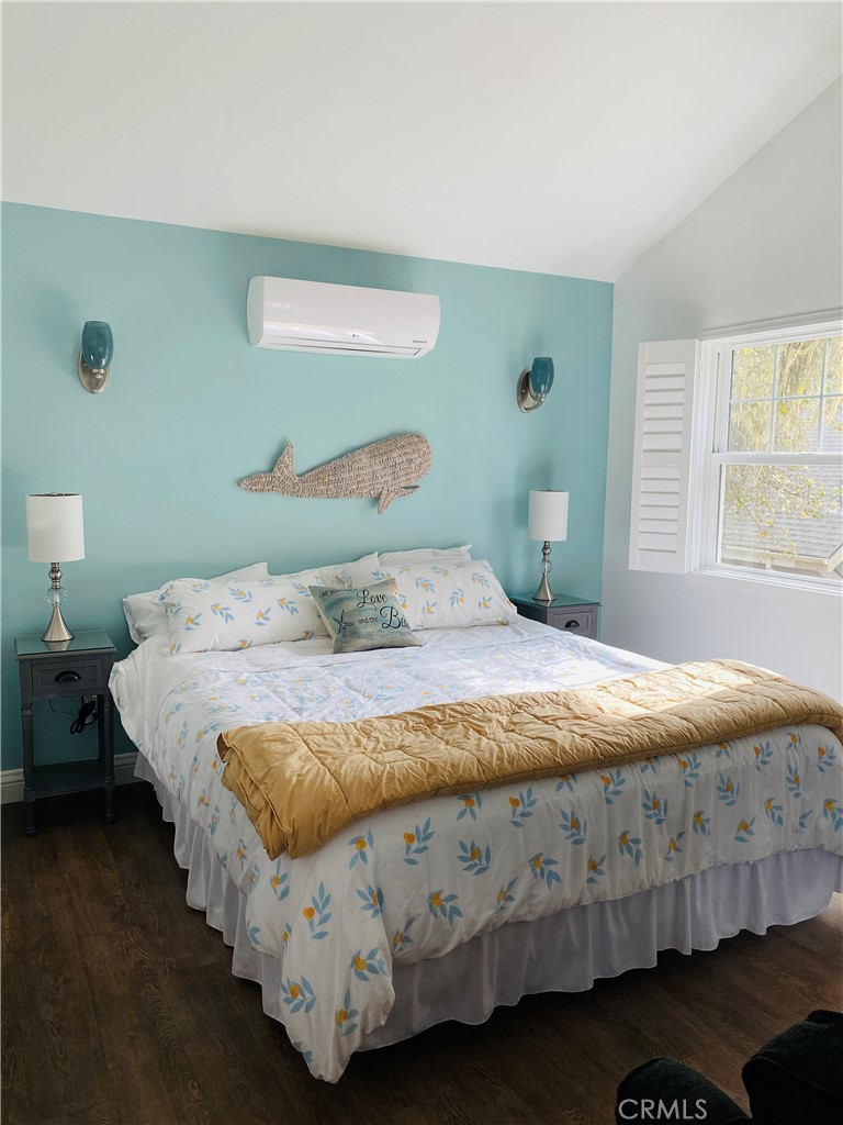 1560 Emerson Road Cambria, CA 93428 - Photo 10 of 13 Comfy and cozy sleeping area with a wall-mounted heating and cooling unit (Mini split) this unit heats the entire studio