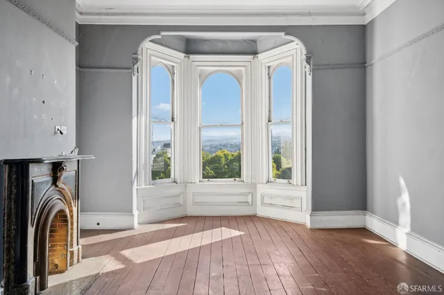 a view of front door with wooden floor