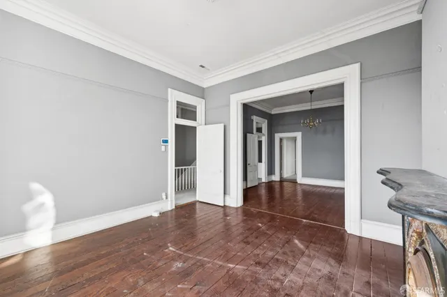 a view of livingroom with window wooden floor and window