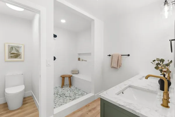 a bathroom with a sink and a toilet