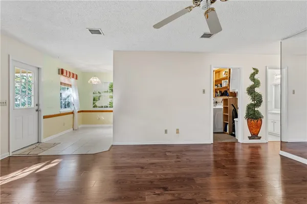 a view of a livingroom with wooden floor