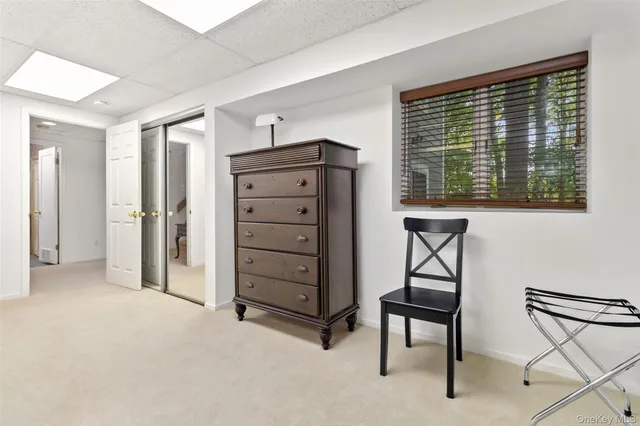 a bedroom with a bed and furniture