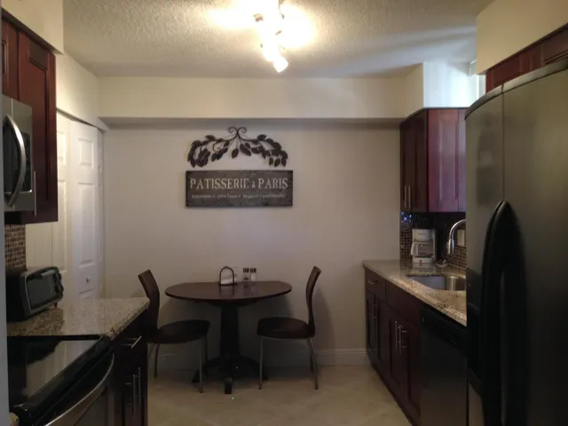 a view of a workspace with furniture