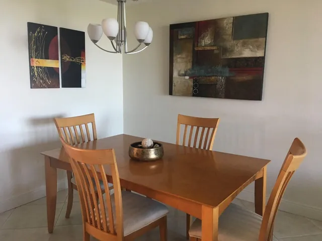 a view of a dining room with furniture
