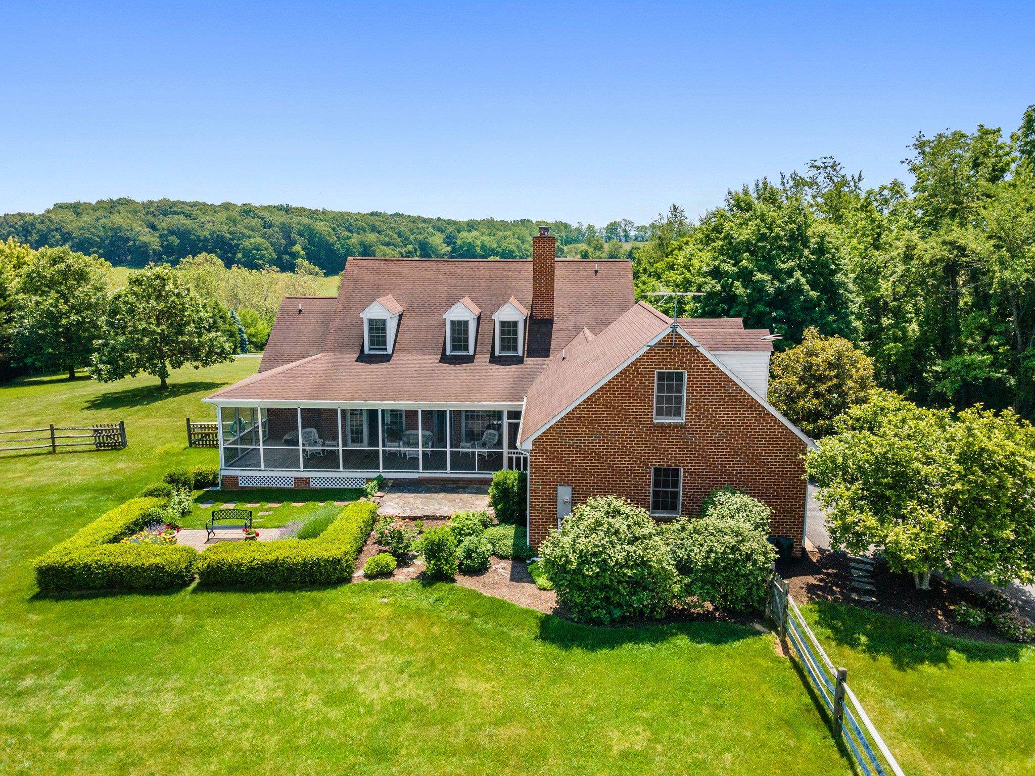 1217 Middlebrook Road Staunton, VA 24401 - Photo 13 of 46 a aerial view of a house with swimming pool next to a big yard