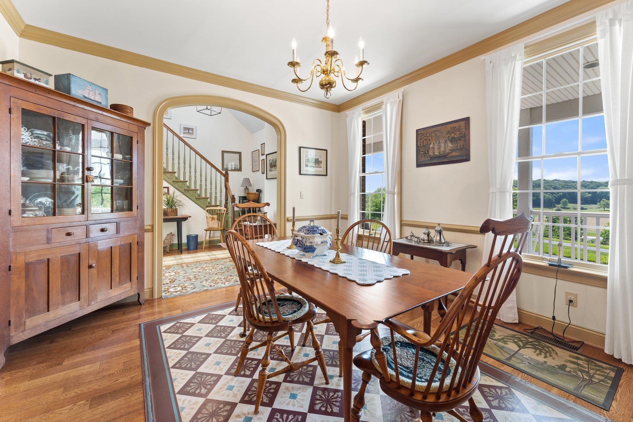 1217 Middlebrook Road Staunton, VA 24401 - Photo 20 of 46 a view of a dining room with furniture window and wooden floor