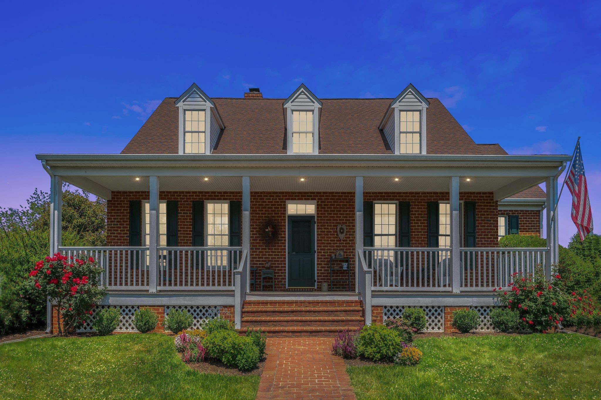 1217 Middlebrook Road Staunton, VA 24401 - Photo 2 of 46 a front view of a house with garden