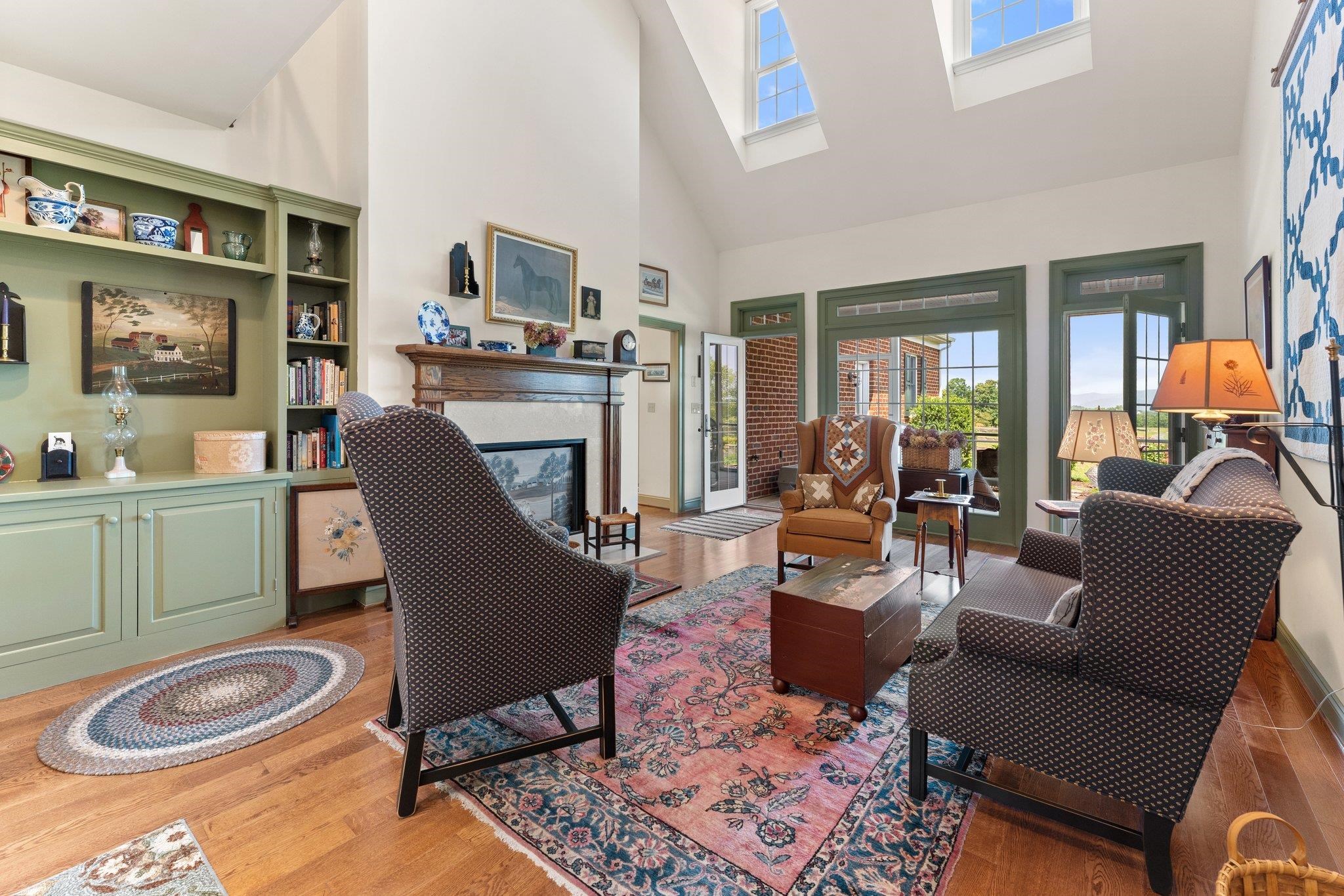 1217 Middlebrook Road Staunton, VA 24401 - Photo 21 of 46 a living room with furniture a rug and a large window