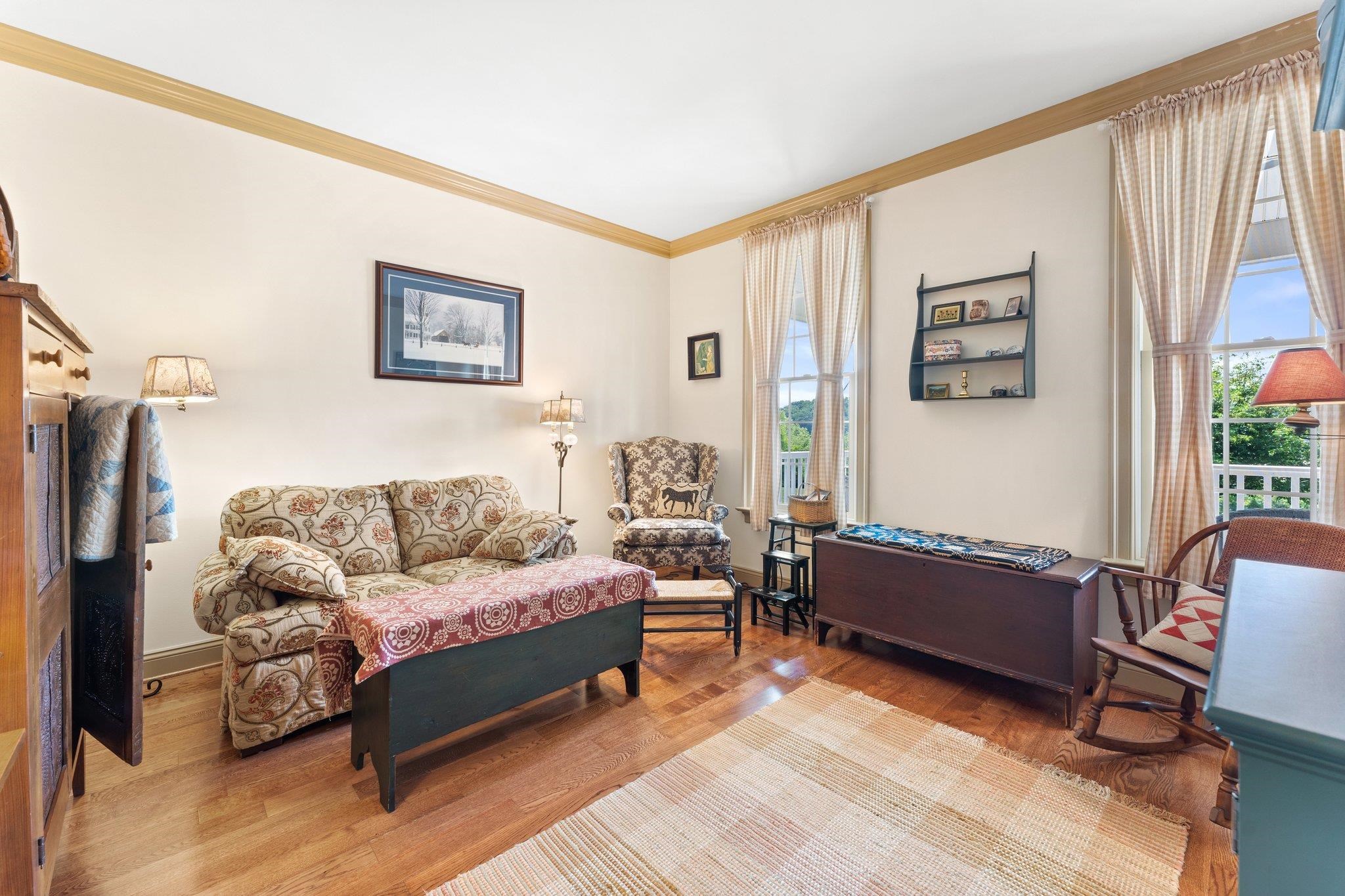 1217 Middlebrook Road Staunton, VA 24401 - Photo 24 of 46 a living room with furniture and a large window