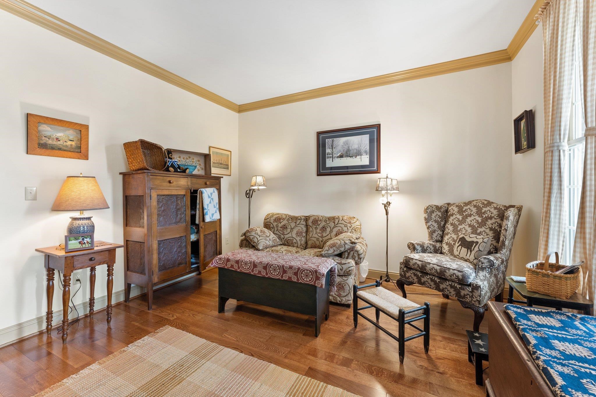 1217 Middlebrook Road Staunton, VA 24401 - Photo 25 of 46 a living room with furniture and a lamp