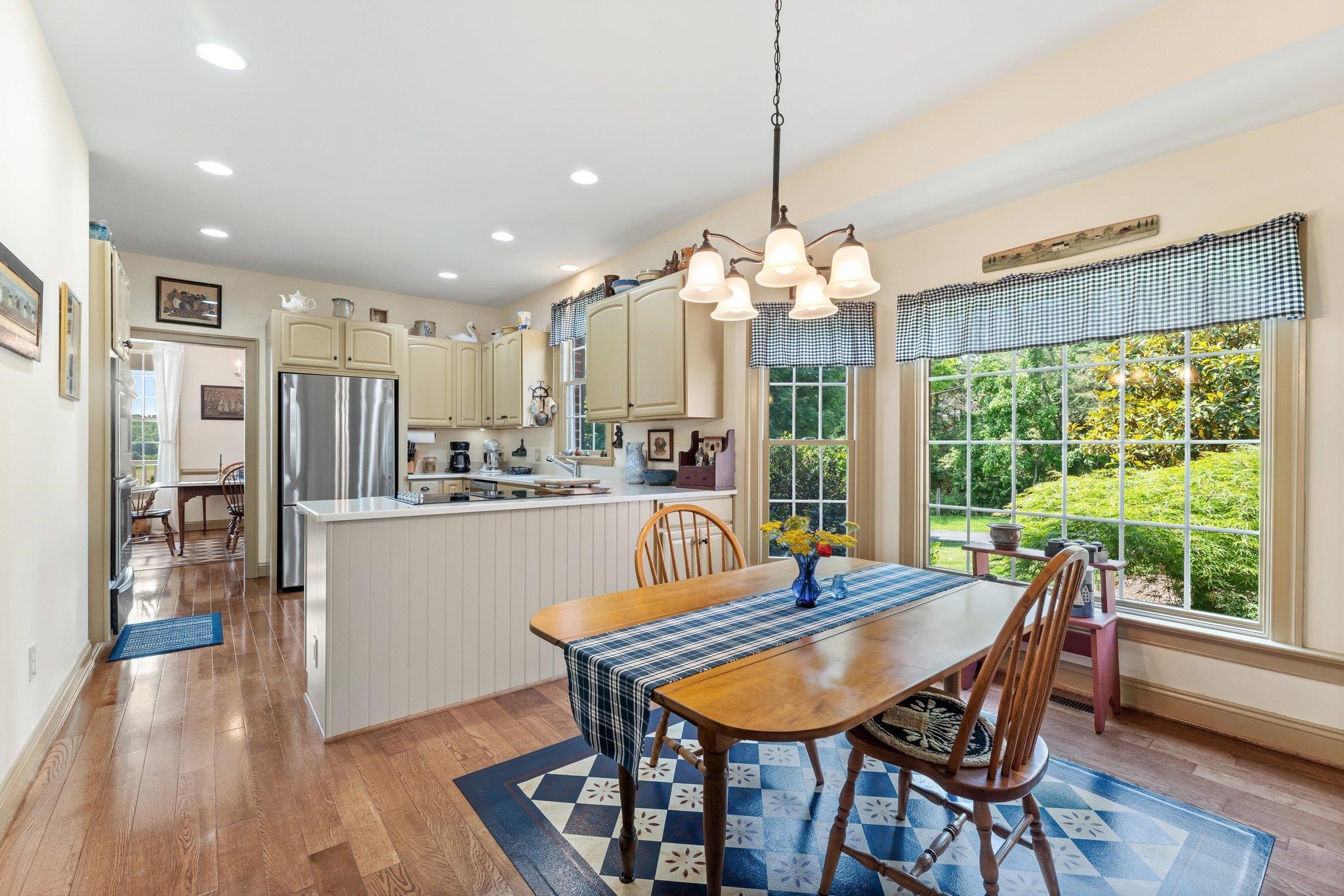 1217 Middlebrook Road Staunton, VA 24401 - Photo 30 of 46 a dining room filled chandelier and wooden floor