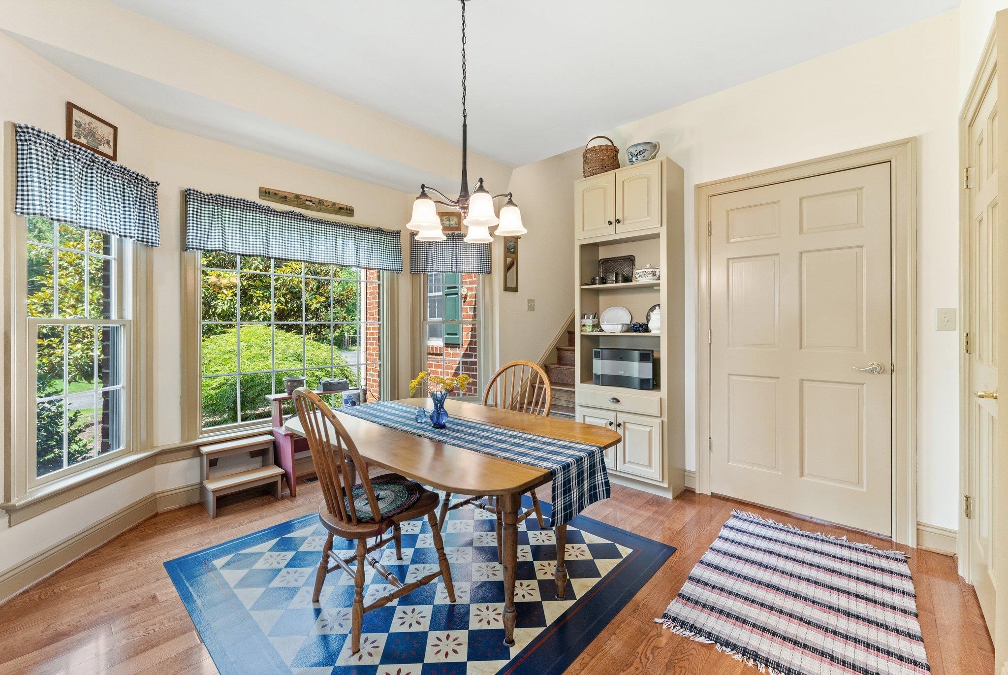 1217 Middlebrook Road Staunton, VA 24401 - Photo 31 of 46 a view of a dining room with furniture window and wooden floor