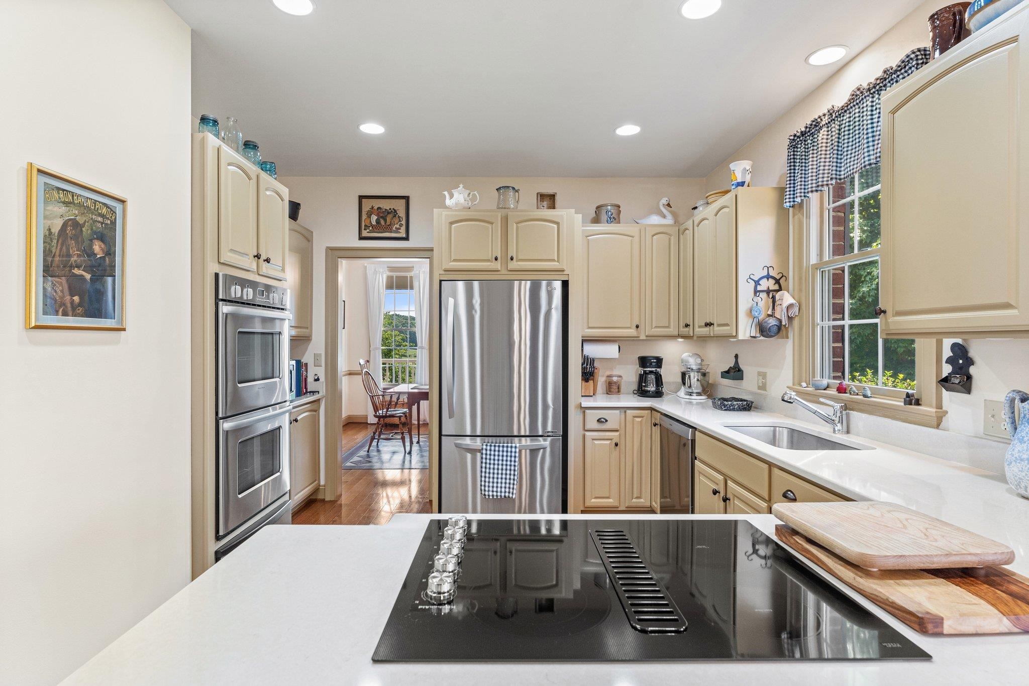 1217 Middlebrook Road Staunton, VA 24401 - Photo 33 of 46 a kitchen with a refrigerator sink and cabinets