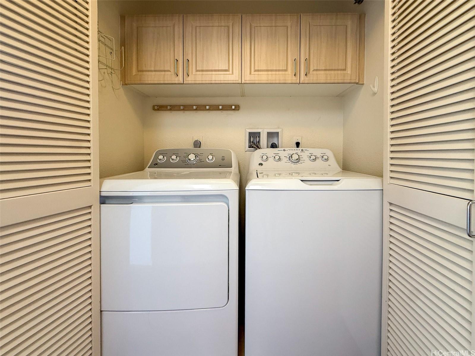 92-1519 Ali'inui Drive, Unit 12A Kapolei, HI 96707 - Photo 11 of 25 a utility room with dryer and washer